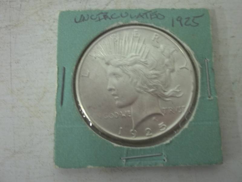 lot 107 image: 1925 Peace Silver Dollar %90 silver