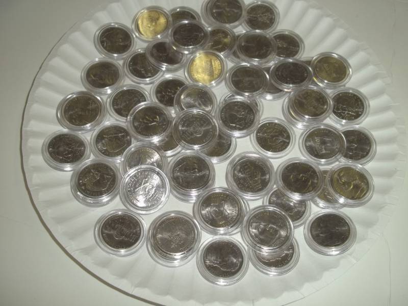 lot 126 image: Lot of nickels in cases, assorted years