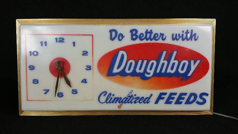 lot 42 image: Doughboy Feeds lighted Clock & Sign