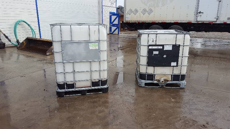 lot 22 image: 2 Used Empty one 325 gal, one 250 gallon Shuttle