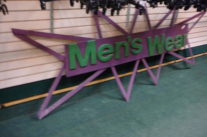 lot 53 image: Menswear sign