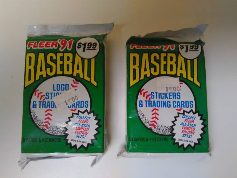 lot 555 image: 2 Rack Packs, 1991 Fleer Baseball Cards (53 cards  4 stickers per package)