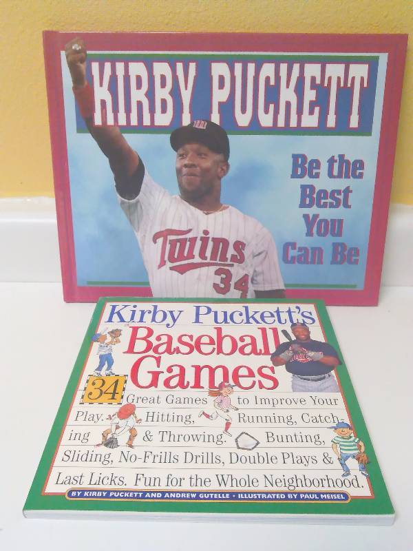 lot 602 image: Kirby Puckett Books, Be the best you can be and Kirby Pucketts Baseball games