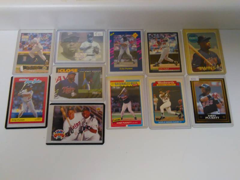 lot 639 image: Kirby Puckett Cards (11) Baseball Cards, all in Hard Protective Cases