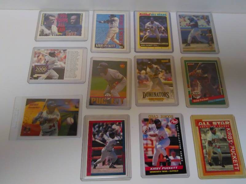lot 643 image: Kirby Puckett Cards (12) Baseball Cards, all in Hard Protective Cases