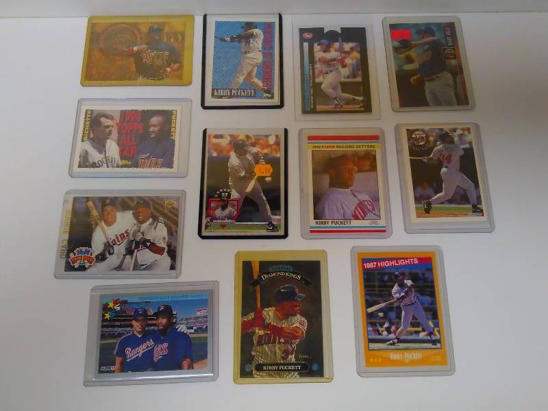 lot 647 image: Kirby Puckett Cards (12) Baseball Cards, all in Hard Protective Cases