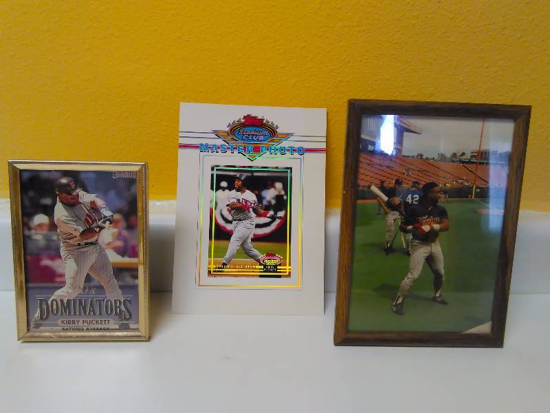 lot 659 image: Kirby Puckett (3) Baseball Photos, 90s Dunruss Dominators Batting Average,3.25 x 5 in Frame Pre-Game, 4.5 x 6.5 in. Topps Stadium Club, Master Photo 5 x 7 in.