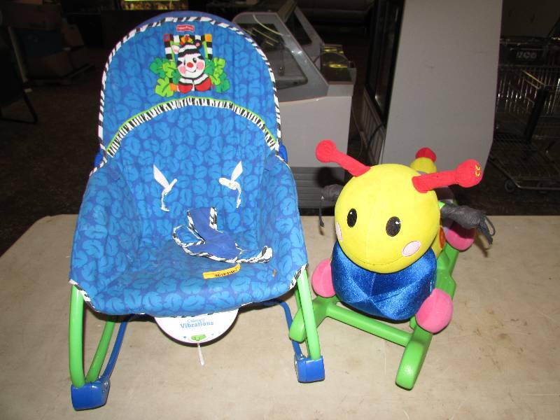 lot 9 image: Vibrating rocker and caterpillar rocker toy
