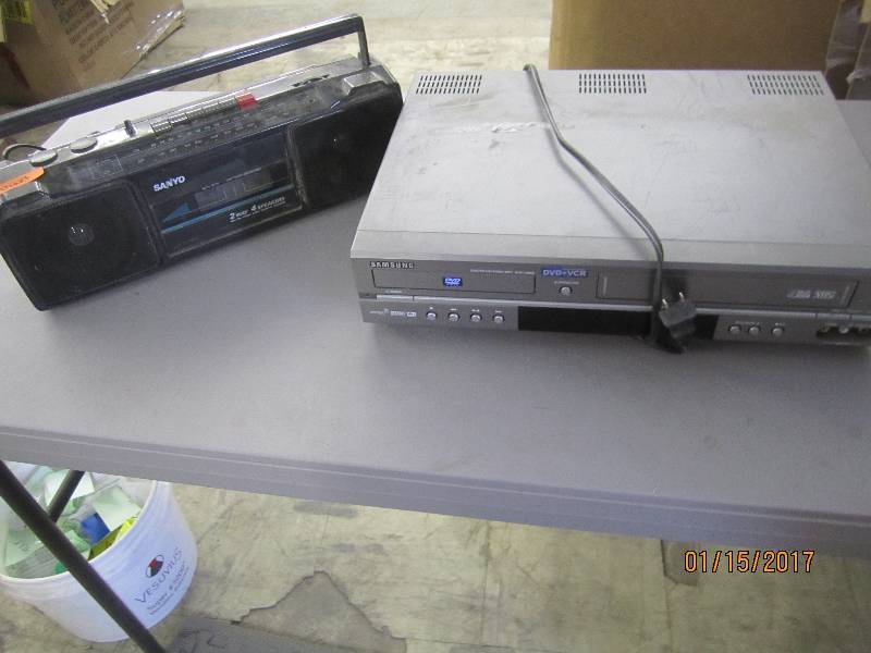 lot 15 image: Samsung DVD-VCR, Sanyo Cassette Rad...