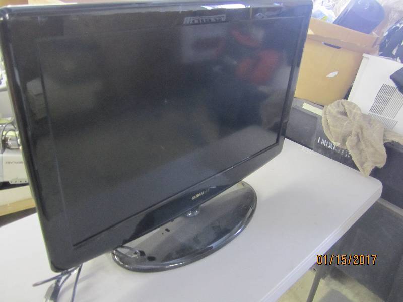 lot 28 image: GlobalVue 32 inch LCD TV with stand...