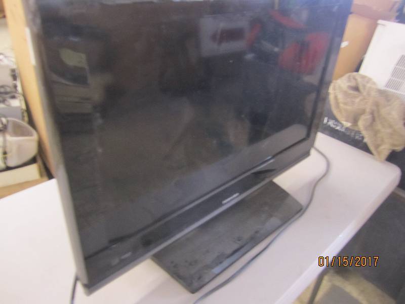 lot 30 image: Toshiba 26 inch TV with stand ,test...