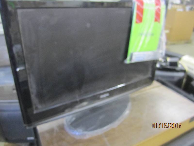 lot 31 image: Insignia 32 inch  LCD TV & DVD Play...