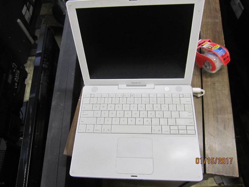 lot 42 image: Apple White iBook G4, powers on...