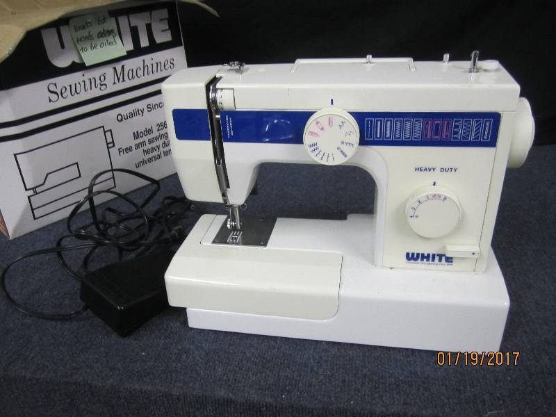 lot 205 image: White Portable Heavy Duty Sewing Ma...