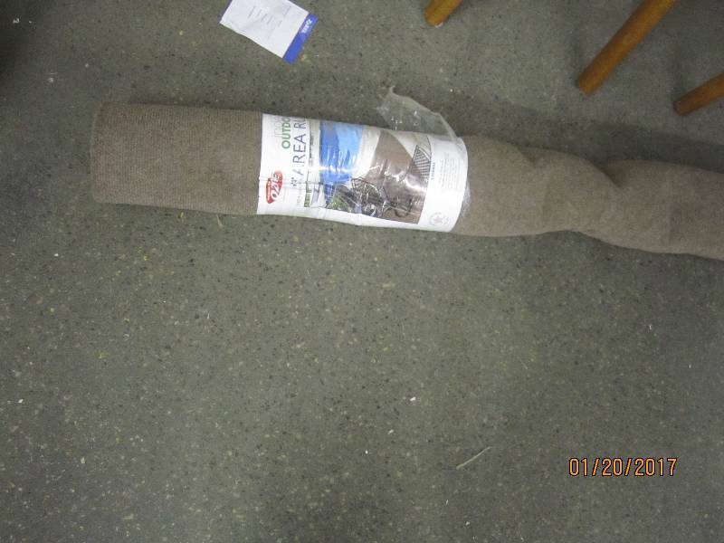 lot 252 image: 6x8 ft Indoor Outdoor Area Rug...