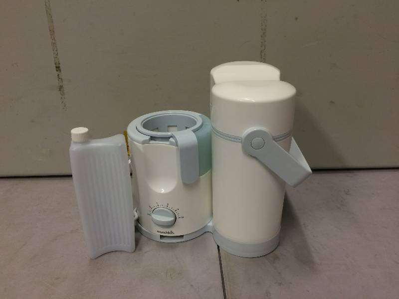 lot 62 image: Munchkin warmer and cooler included