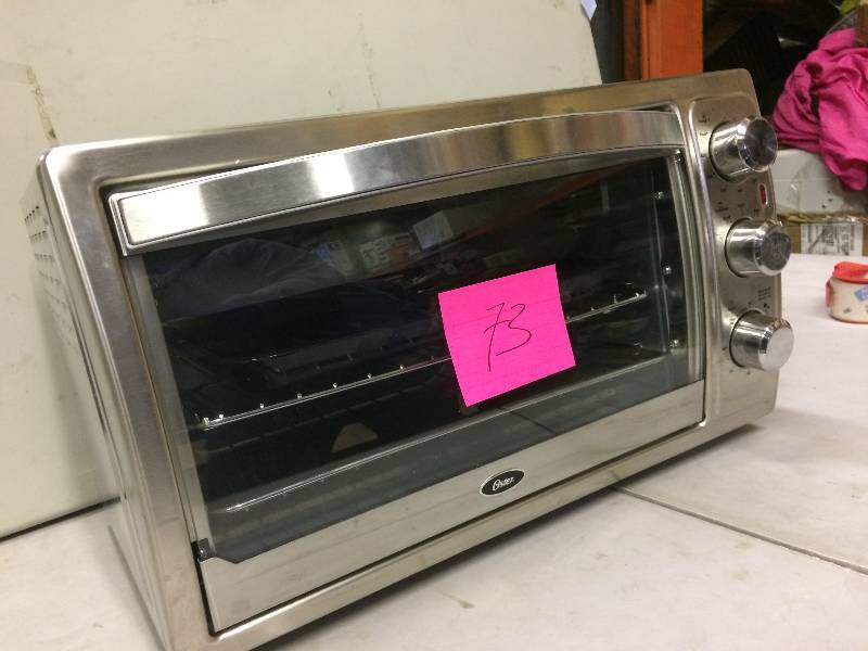 lot 73 image: Oster Conventional Oven Open Box not used