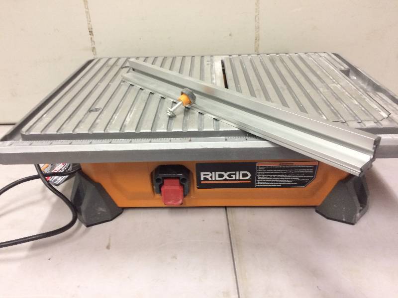 lot 87 image: Ridgid 7 in Wet Tile saw Portable Job Site