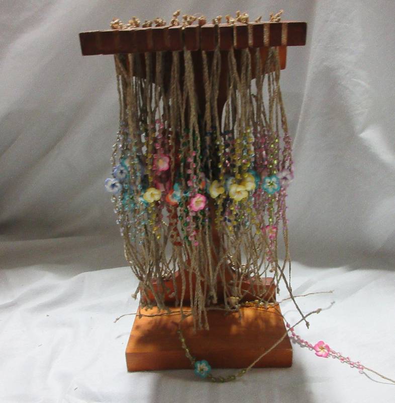 NEW- LARGE SELECTION OF BRACELETS AND STAND
