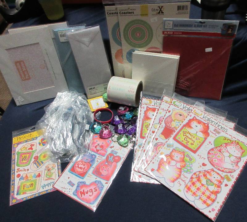NEW LOT OF KEY CHAINS, BRACELET, STICKERS, CARD STOCK COVER MISC
