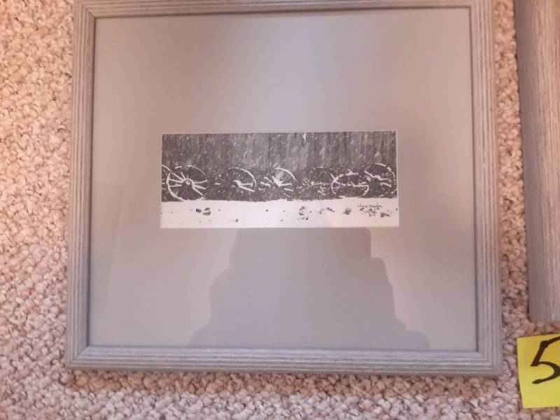 2 nicely framed black and white pictures.  16in x 14in 15in x 14in