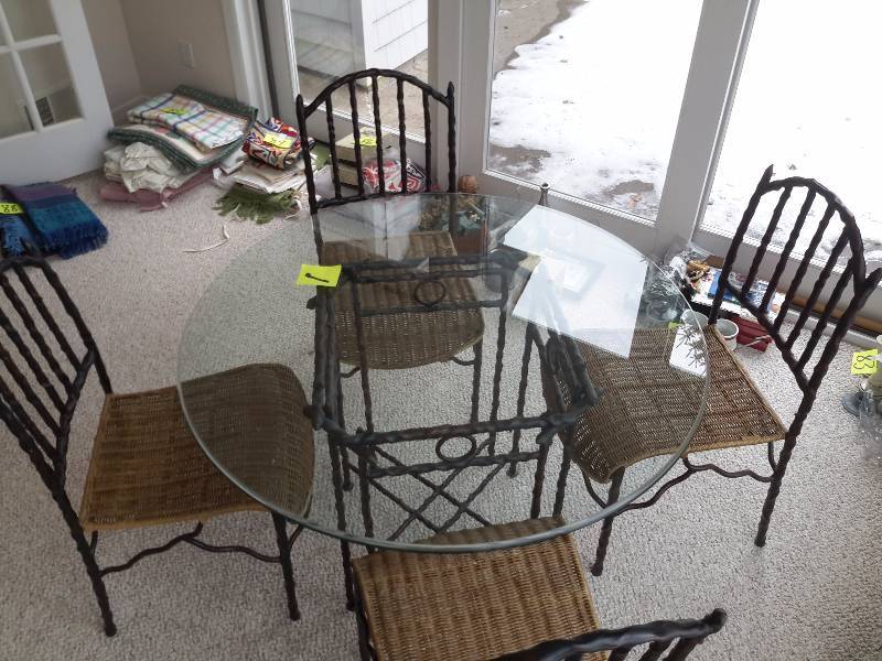 42 in diam w4 caned chairs.. Grape Vine Theme, Wrought iron with glass top.