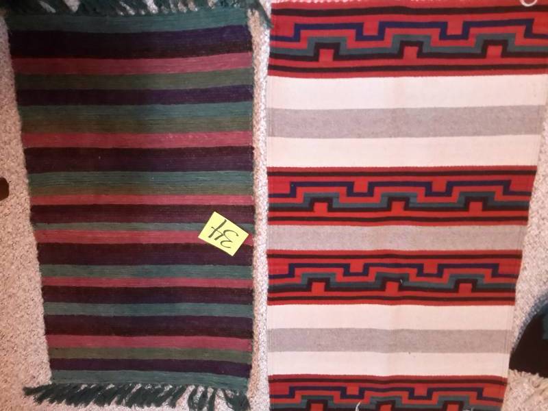 2 nice rugs as pictured.  20in x 35in 24in x 41 in