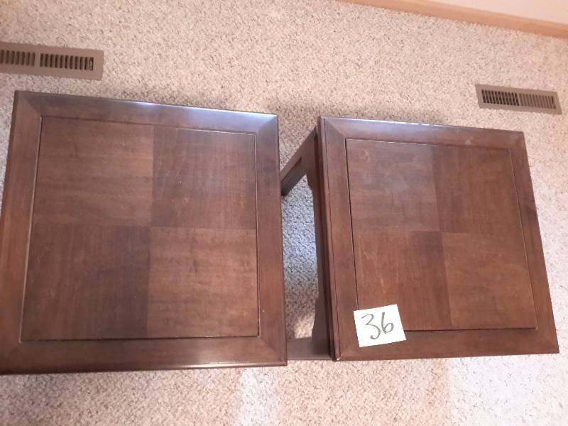 2 nice solid wood endside tables.. Looks like walnut wood.  20in x 20 in. x 17 in h