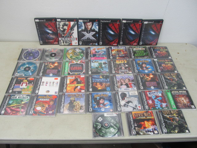 lot 26 image: Large Lot of Playstation 1 & 2 Video Games