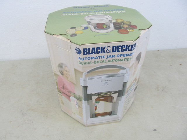 lot 54 image: NEW Black & Decker Automatic Jar Opener