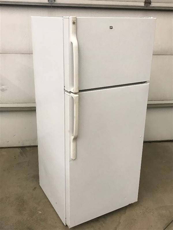 lot 12 image: GE Refrigerator  Freezer