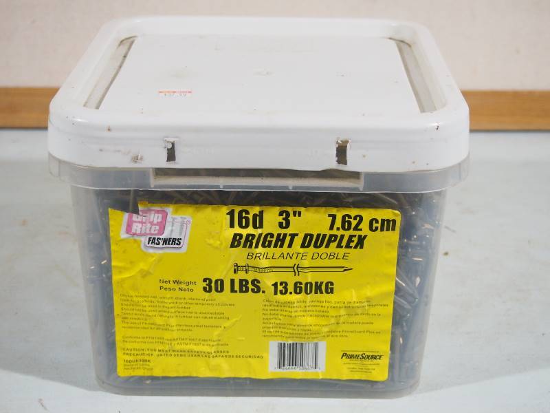lot 157 image: 30 Pound Bucket 16d 3 Bright Duplex Nails