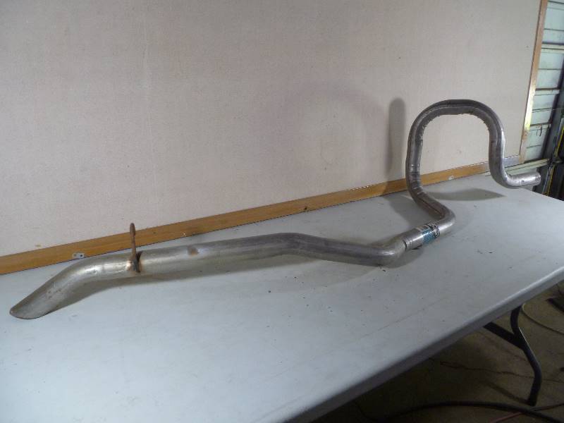 lot 133 image: NEW 1990-1995 Lincon Town Car Tailpipe