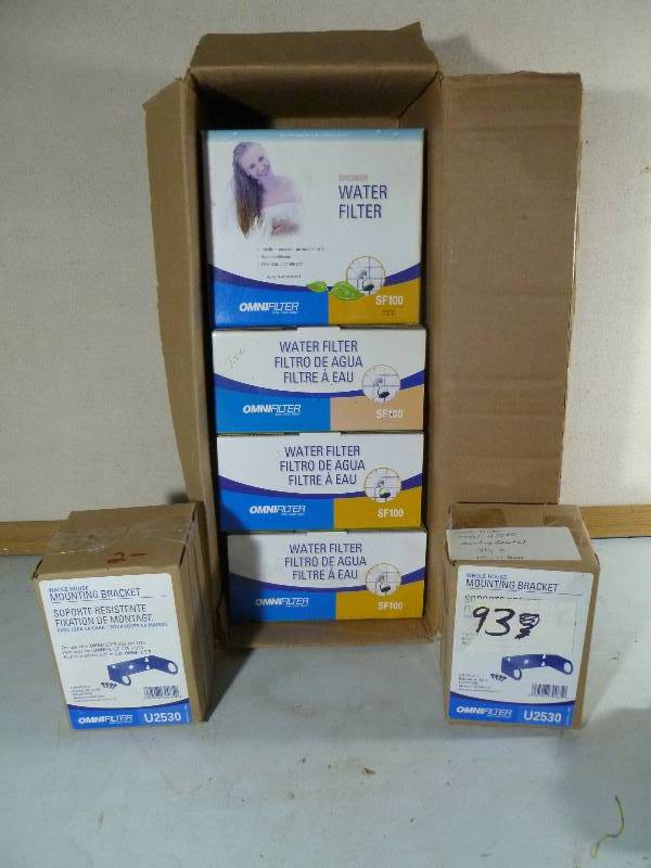 lot 93 image: Case of 4 NEW OmniFilter Shower Water Filters & 4 Brackets