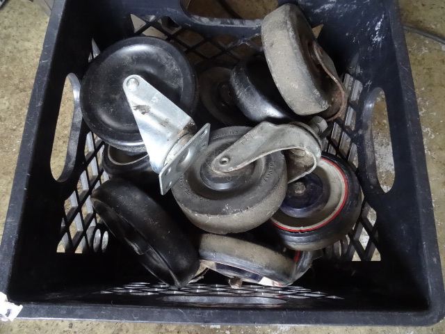 Milk crate full of misc casters...