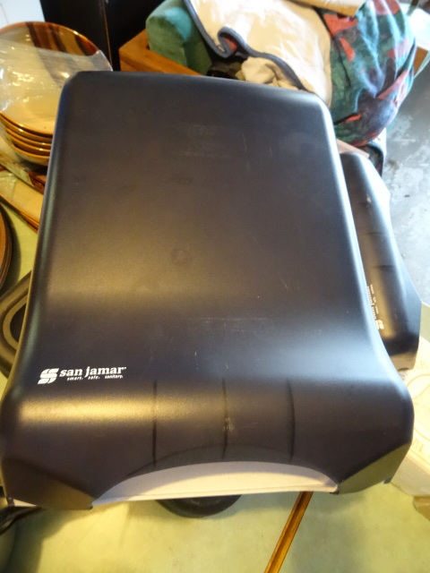 2 San Jamar towel dispensers. ...
