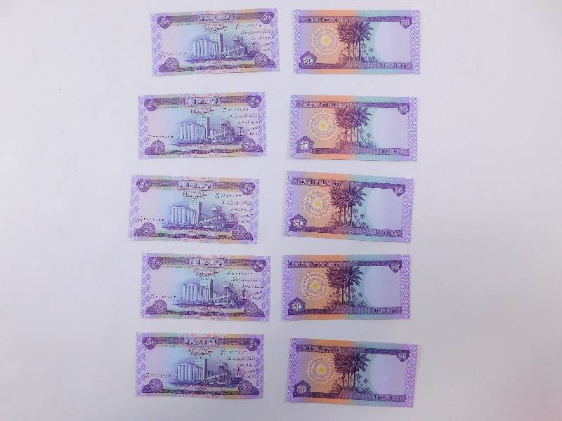 lot 24 image: $5,000 Iraqi Dinar - 10 x $50  $5,000 Dinar