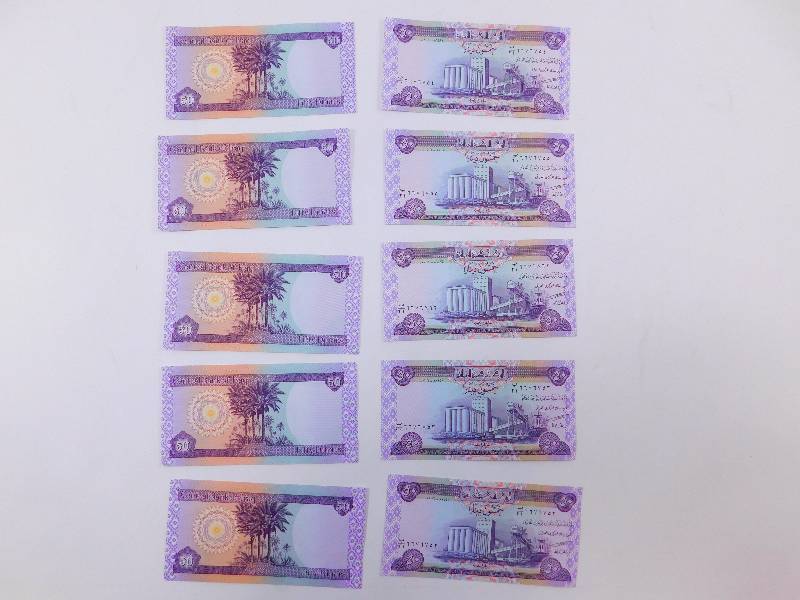 lot 25 image: $5,000 Iraqi Dinar - 10 x $50  $5,000 Dinar
