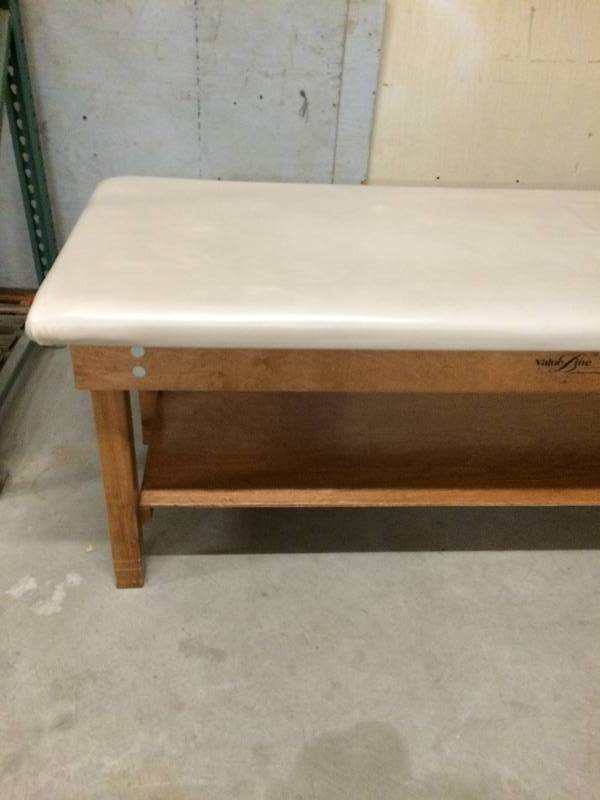 lot 56 image: Extra Heavy Duty H-Brace Medical Examination Exam Upholstered Padded Physical Therapy Treatment Table With Shelf Below Nice Condition Could be used for massage as well