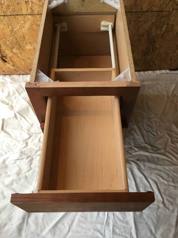 lot 10 image: Building Surplus New Pre-Finished Vanity Base Cabinet