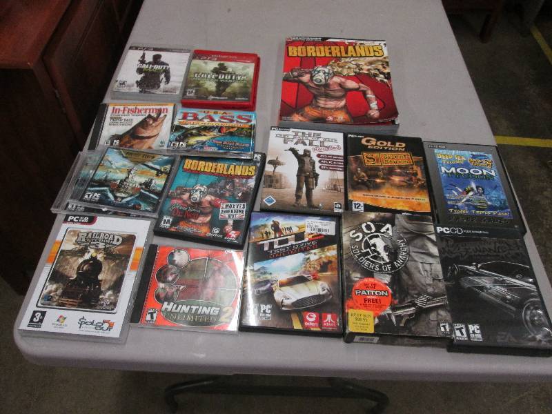 lot 24 image: Lot of PC Games, 1 Guide Book, 2 PS...