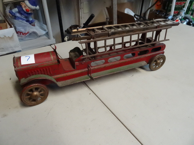 lot 7 image: Vintage metal ladder fire truck. Un...