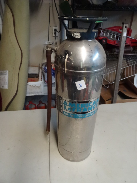 lot 31 image: Vintage American Lafrance fire exti...