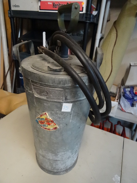 lot 55 image: Vintage Dobbins super bilt galvanized hand pump fire extinguisher.