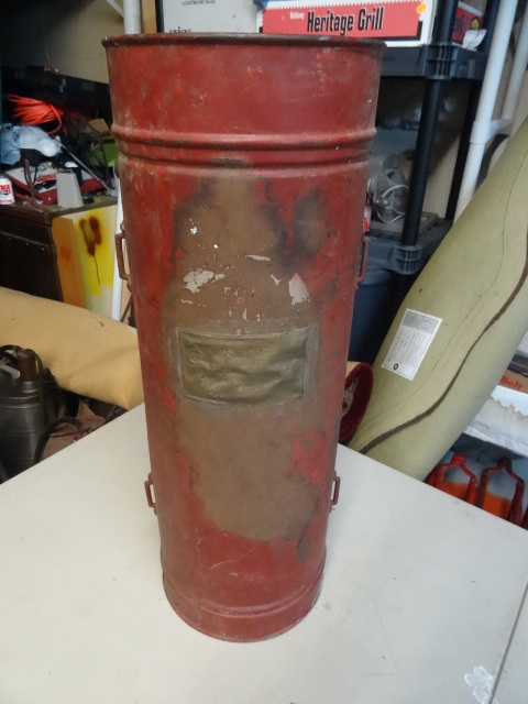 lot 57 image: Vintage Champion fire extinguisher.