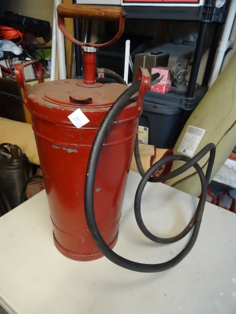 lot 59 image: Vintage Dobbins super bilt galvanized hand pump fire extinguisher.