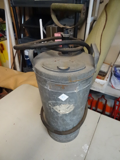 lot 67 image: Vintage Dobbins super bilt galvanized hand pump fire extinguisher.