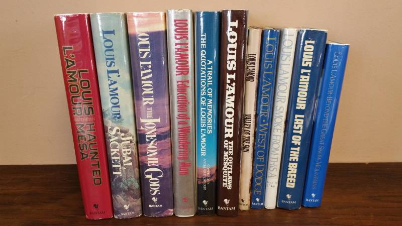 lot 166 image: (11) Louis Lamour Books