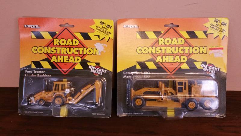 lot 56 image: (2) ERTL Road Construction Toys New in Packaging