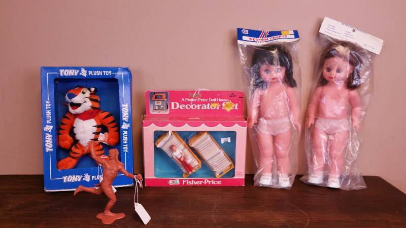 lot 66 image: 1980s Tony the Tiger Plush in Box, Marx Indian Figure, 1978 Fisher Price in Box, Dolls